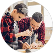 dad and son working with hand tools