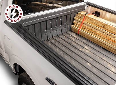 truck pick up bed with amige impactliner installed loaded with lumber
