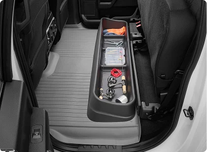 underseat storage system installed in vehicle holding fishing gear